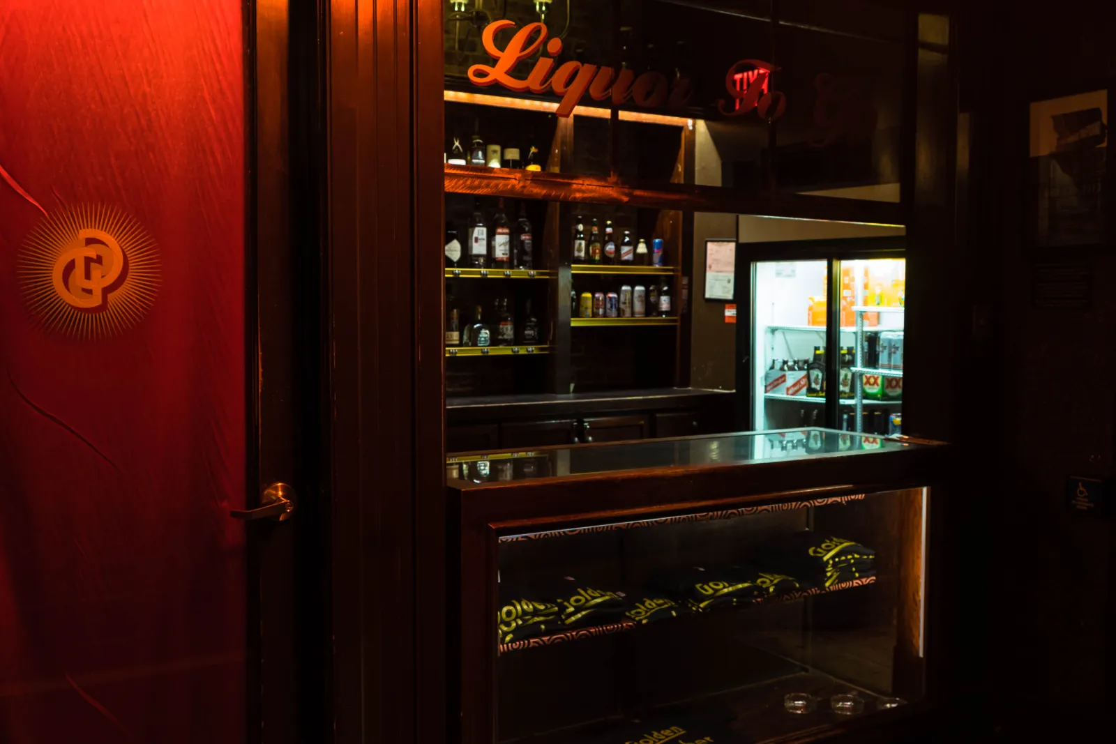 The liquor-to-go case stocked with bottles