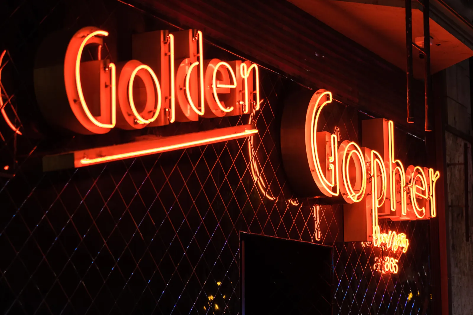 The Golden Gopher neon sign at night